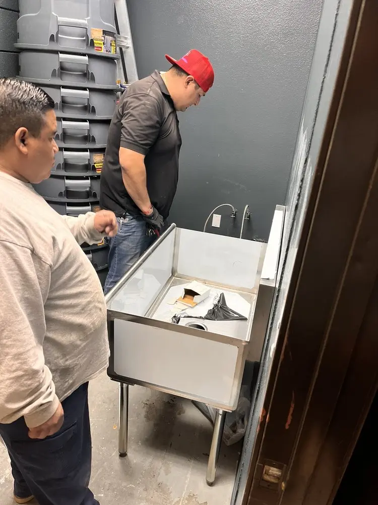 Commercial plumbing and sink installation in Olmstead
